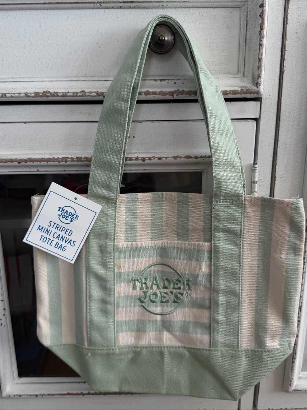 Title: Trader Joe's Pastel Striped
Mini Canvas Bag Green